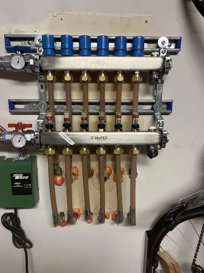 Plumber performing Water Heater Repair at a residential property in Tega Cay